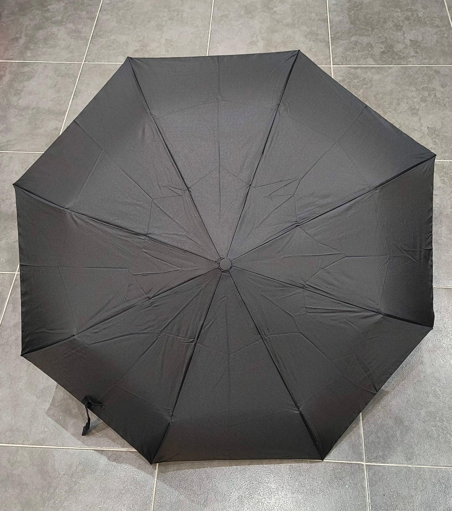 Paraguas Plegable Negro con Funda – Elegancia y Comodidad para Todo Clima - tenemosturegalo.es