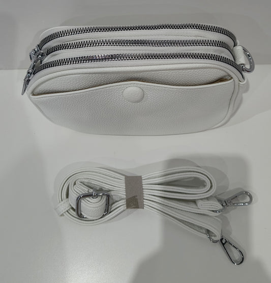 Bolso Bandolera Blanca 21x16x8 cm con Bolsillo Frontal Hermético y tres bolsillos con cierre cremallera ideal para San Fermín