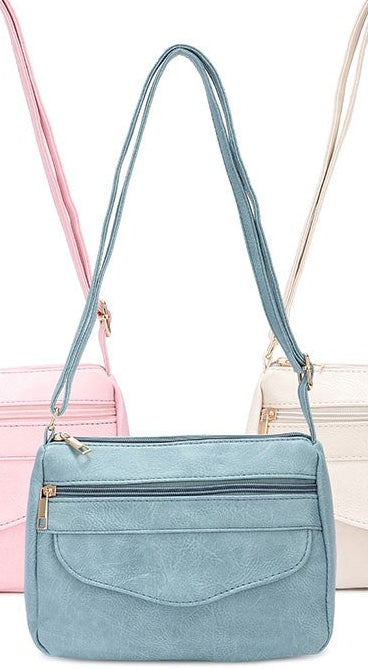 Bandolera Lisa de Polipiel 24 x 18 x 7 cm – Práctica, Elegante y Disponible en Azul, Rosa y Blanco